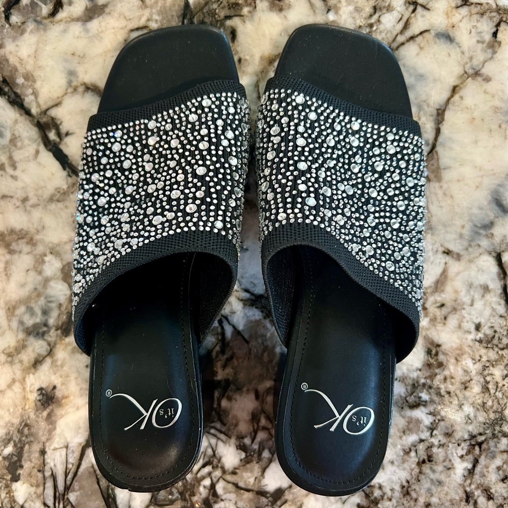 Stylish Black and Silver Embellished Sandals.  Size 7.
2 inch heel.